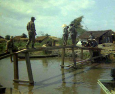 constructing a canal bridge at FOB My Dien I (March 70)
