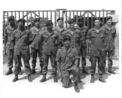Camp A-404 Airboat Site 1970 Cao Lanh (IV Corp, RVN)
Back Row left to right: SSG Don Blue (Medic), SFC  Don Jones (Intel), SP/4 Roy Emerson (Medic), SSG Elree Smith (Intel/Platoon Advisor), SSG Rob Thomas (Radio Operator)

Front Row left to right: MSG Alger Hartnett (Tm Sgt), SGT Stephen Tenorio (Weapons Sgt), SSG John Carpenter (Lt Weapons Sgt), Sgt Charles Whalen (Radio Operator)

Kneeling: CPT Santos Tenorio (Tm Ldr)

