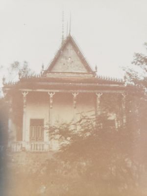 A421 Ba Xoai Buddist Temple
Buddist temple (Wat) located behind (west of) Hill 58/A421 camp proper. Temple was surrounded by CIDG family "hooches" but within the overall camp perimeter. An NVA sapper penetrated the perimeter and took refuge in the temple; CIDG forces killed him by gun fire on the balcony (white balustrade in photo). He was the only on of his 48 man company to penetrate the perimeter.
Keywords: A421 Ba Xoai;Buddist Temple;NVA Sapper KIA